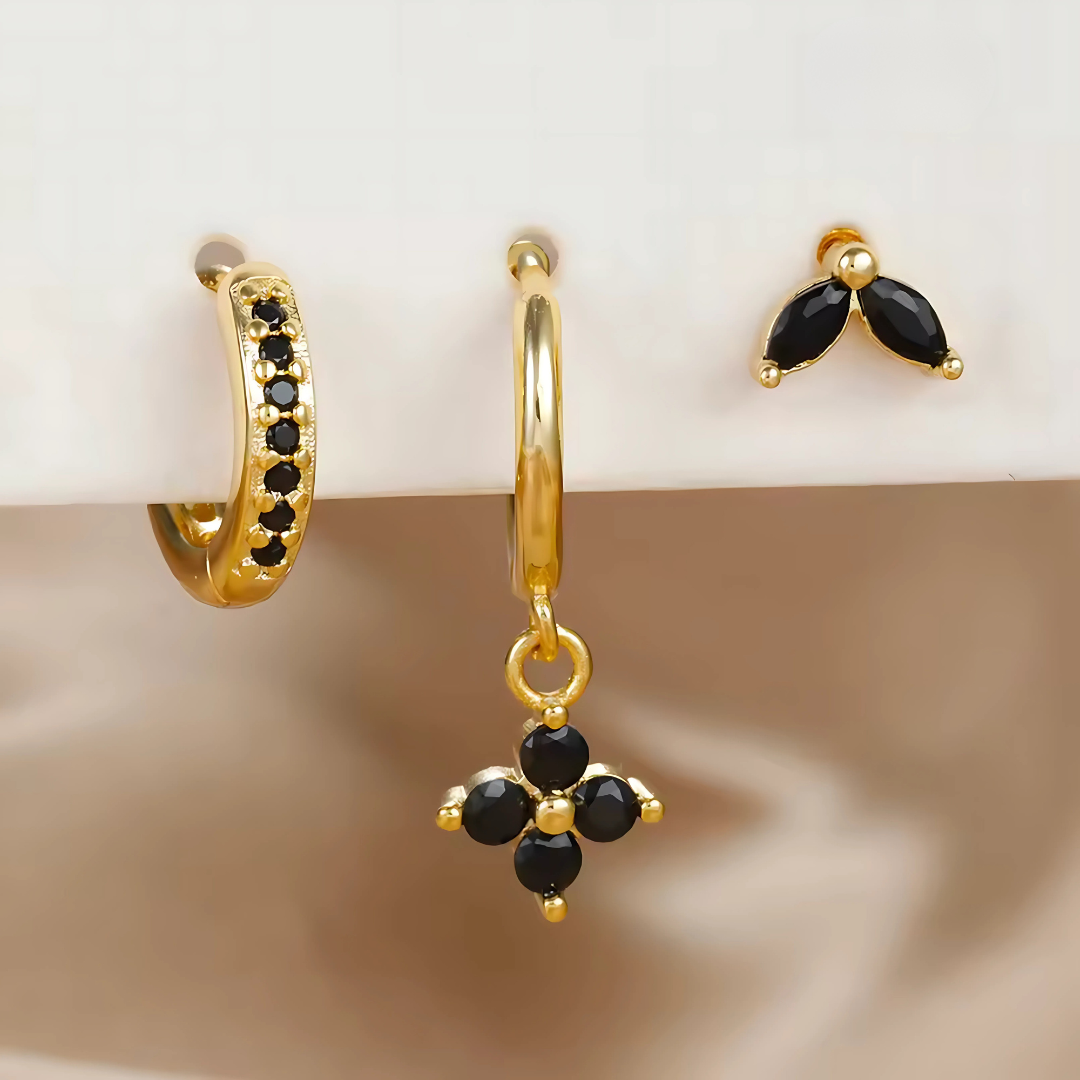 Ensemble Ohrringe und Piercings – Vielseitigkeit und subtile Brillanz