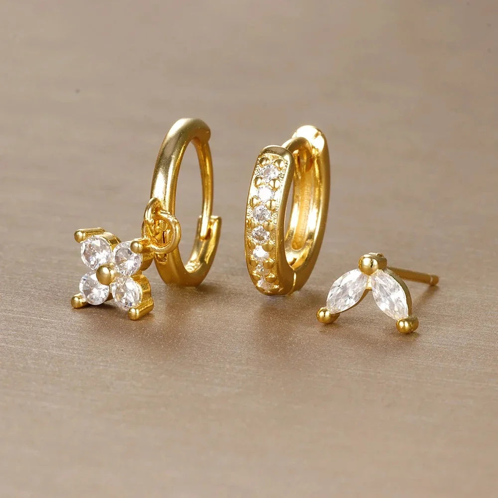 Ensemble Ohrringe und Piercings – Vielseitigkeit und subtile Brillanz