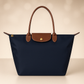 Bonito | Bolsa de Mano Impermeable – Diseño Sutil y Acabados Cuidados 